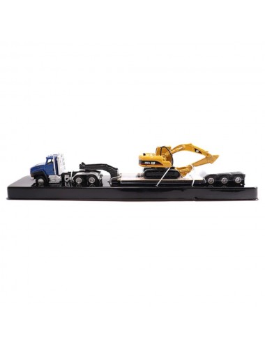 Tractomula Cat con maquina remolcada Tractomula Cat con maquina remolcada